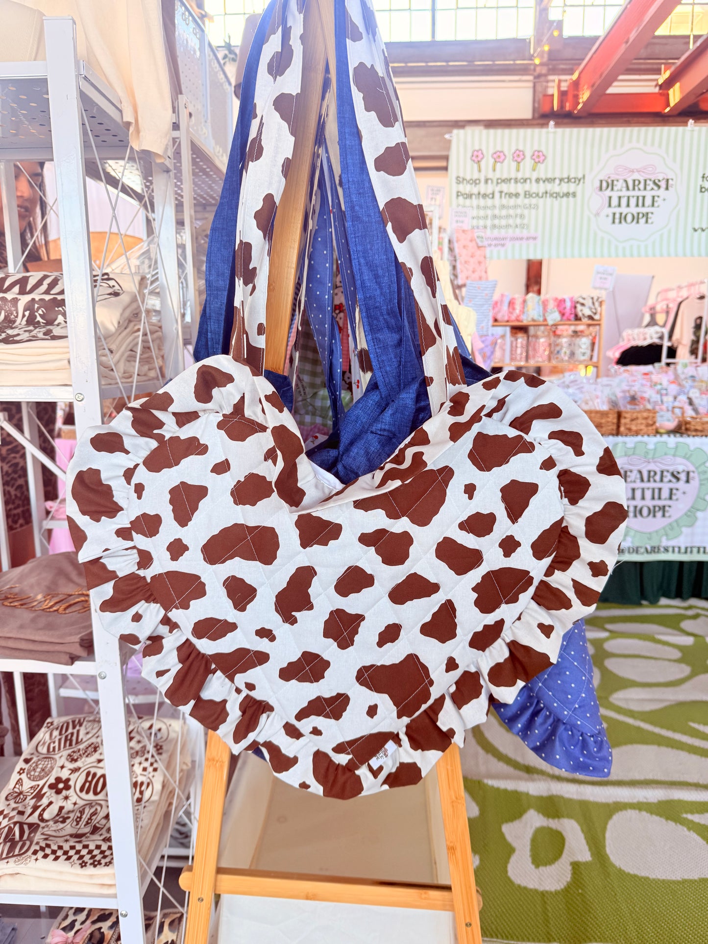 COW PRINT BROWN HEART BOOK BAG