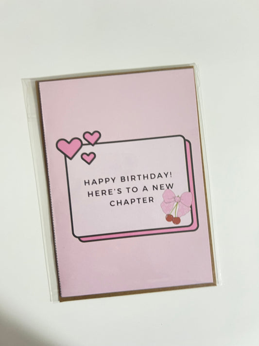 HAPPY BIRTHDAY, HERE’S TO A NEW CHAPTER GREETING CARD