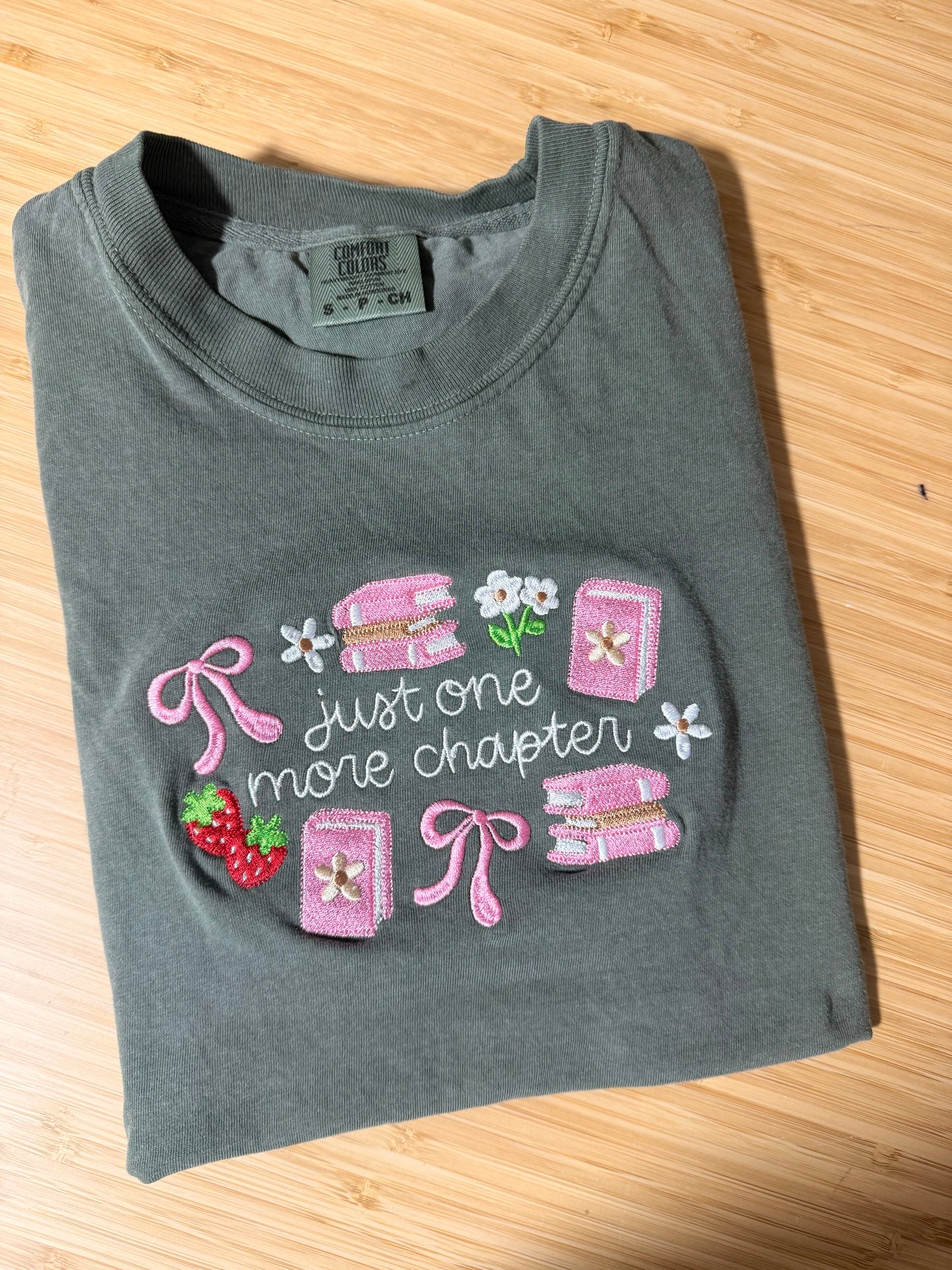 JUST ONE MORE CHAPTER EMBROIDERED ADULT SIZE (COMFORT COLOR MOSS)