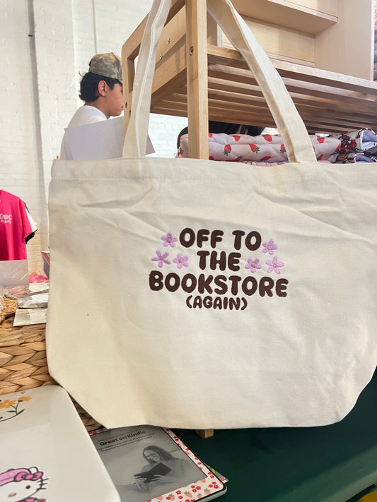 OFF TO THE BOOKSTORE EMBROIDERED CANVAS TOTE BAG