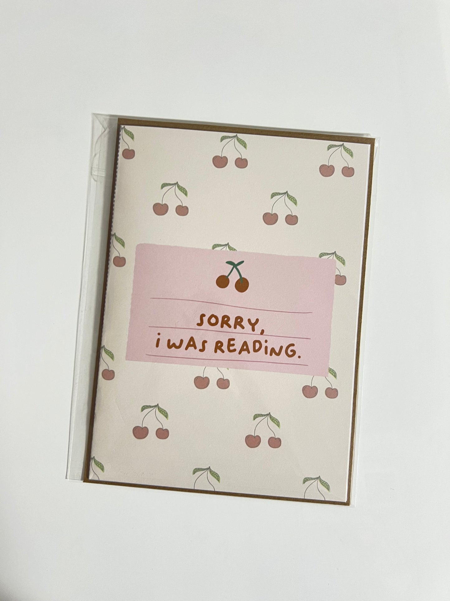 SORRY, I WAS READING GREETING CARD